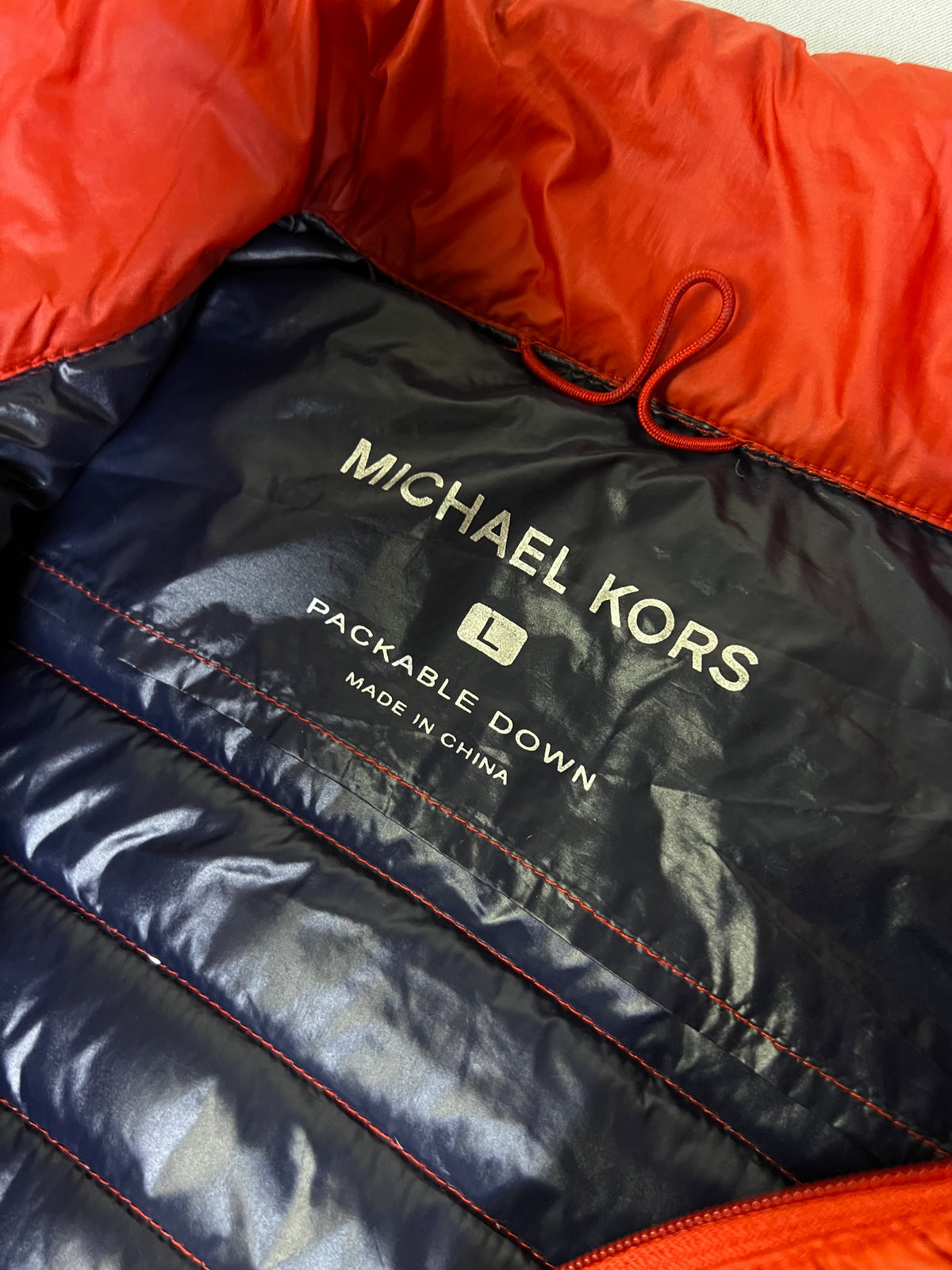 MICHAEL KORS ( DOWN )